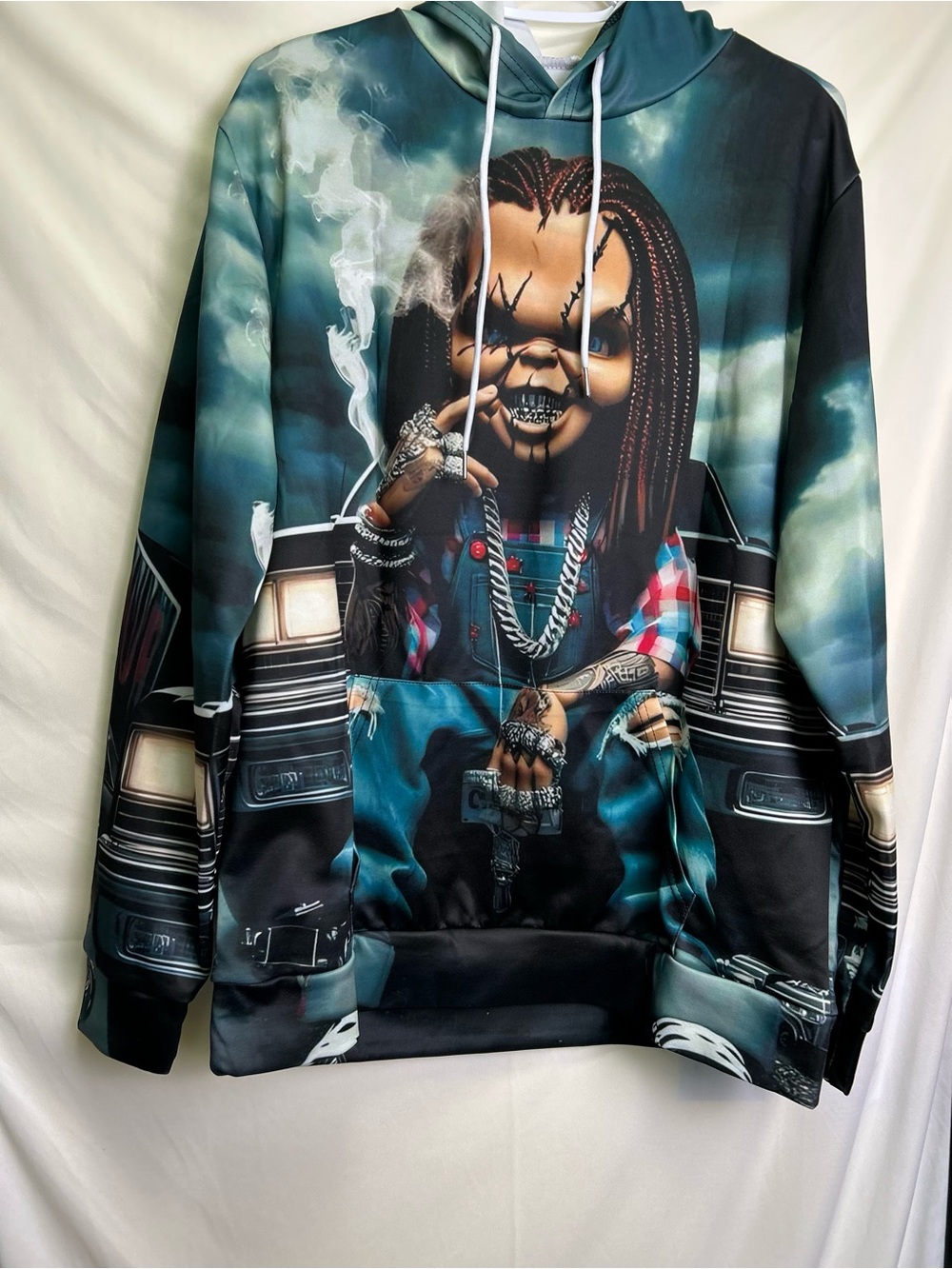 Horror Doll “Chucky” Hoodie in Teal & Black